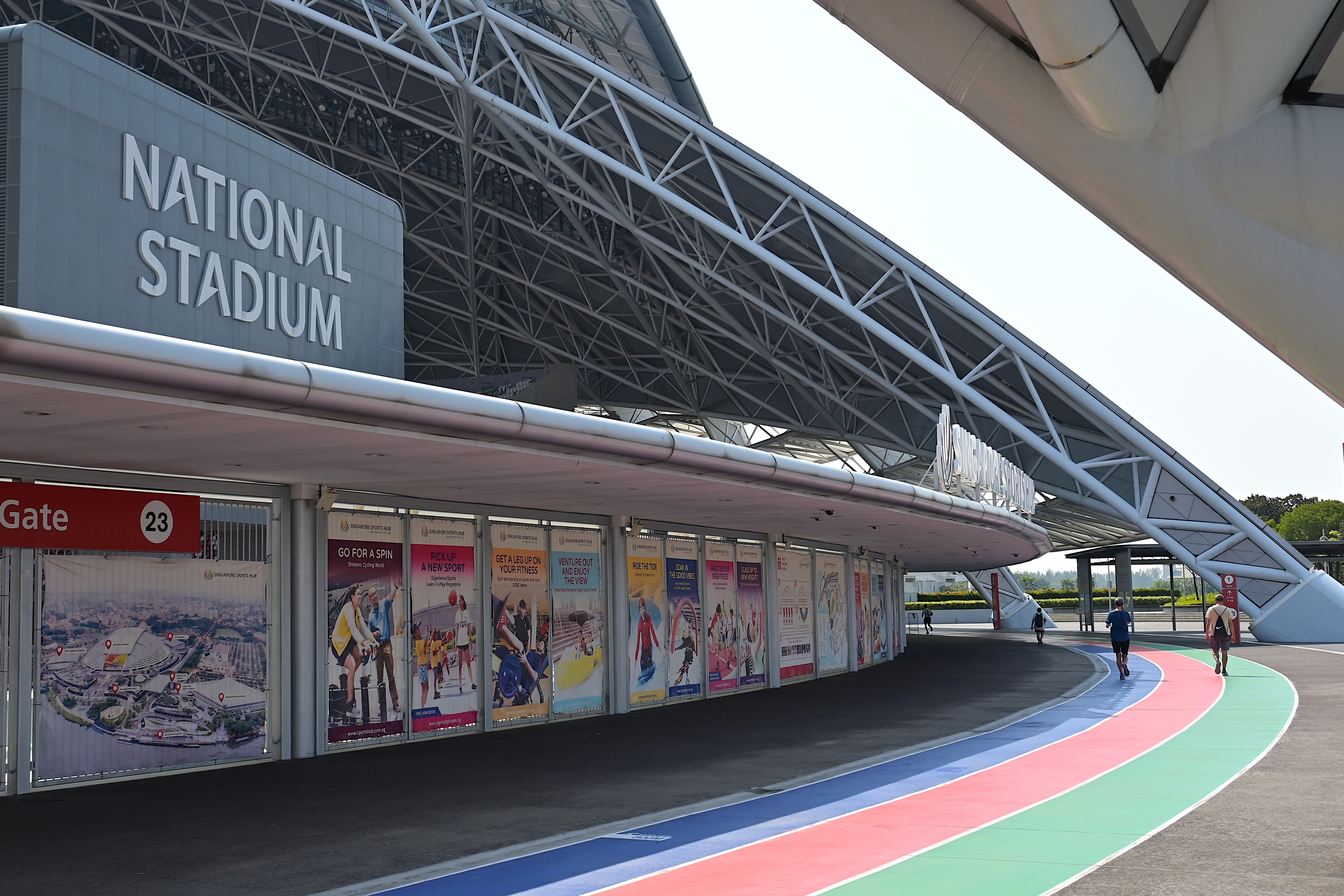 The entrance to the National Stadium at Singapore Sports Hub, with the surrounding running track in the foreground.